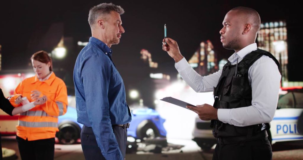 a Man Undergoes Dui Road Test After Car Accident
