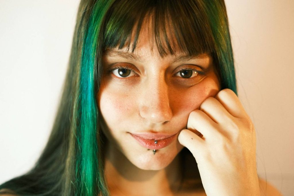 a woman with Piercings